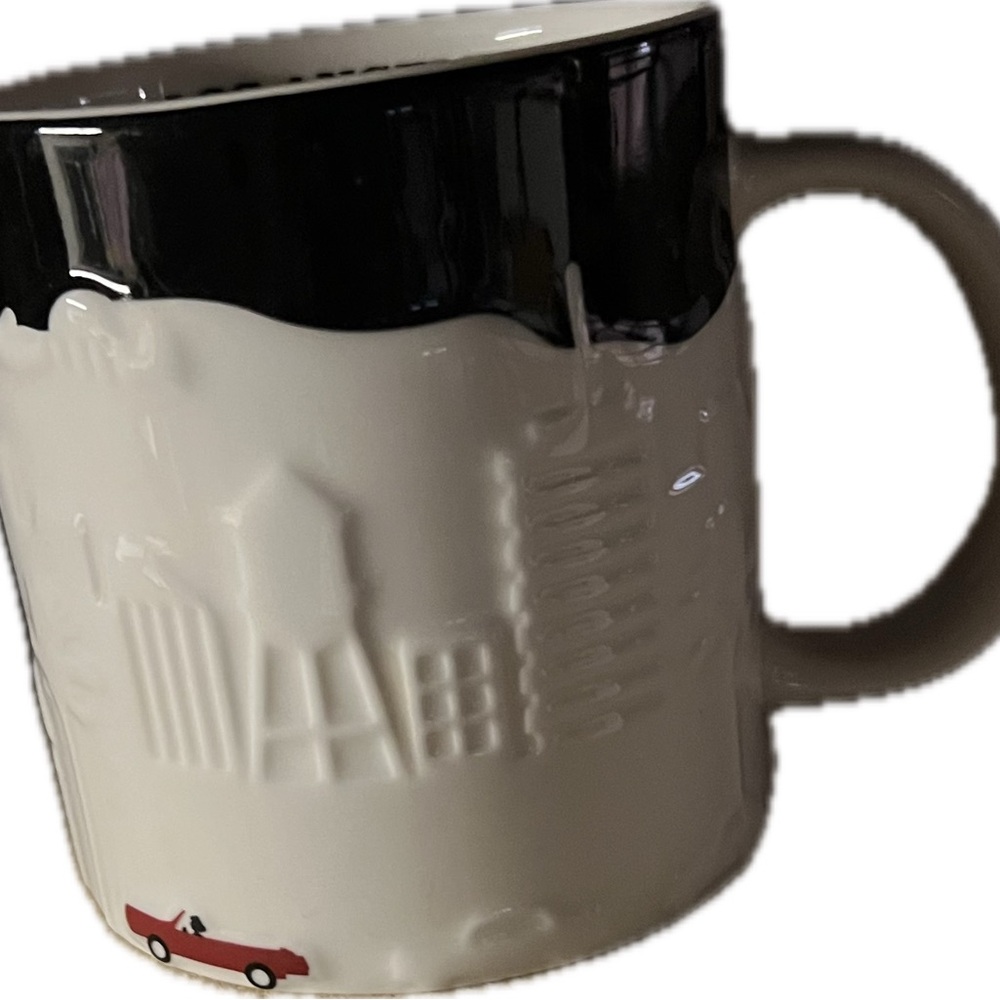 Black and White Ceramic Mug with Red Car Design